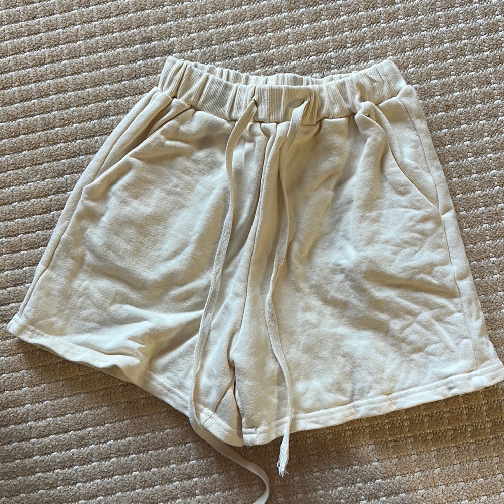 white sweatpants shorts